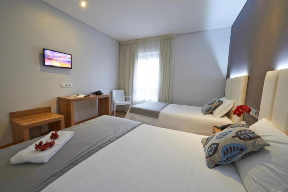 Habitación triple Hotel Azinheira Fátima Habitación triple Hotel Azinheira Fátima