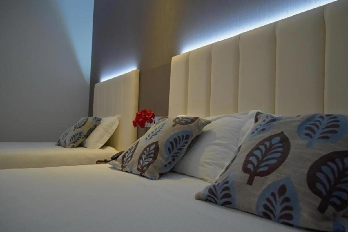 Habitación triple Hotel Azinheira Fátima Habitación triple Hotel Azinheira Fátima